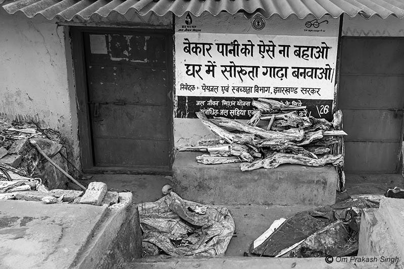 An inconspicuous IEC message written on a private wall in a village in Khunti district, Jharkhand, India